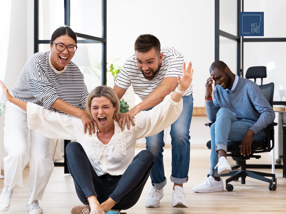 Office employees taking a break and laughing